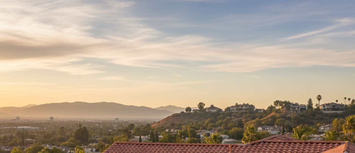 Skilled roofers performing roof repair on a modern Glendale home